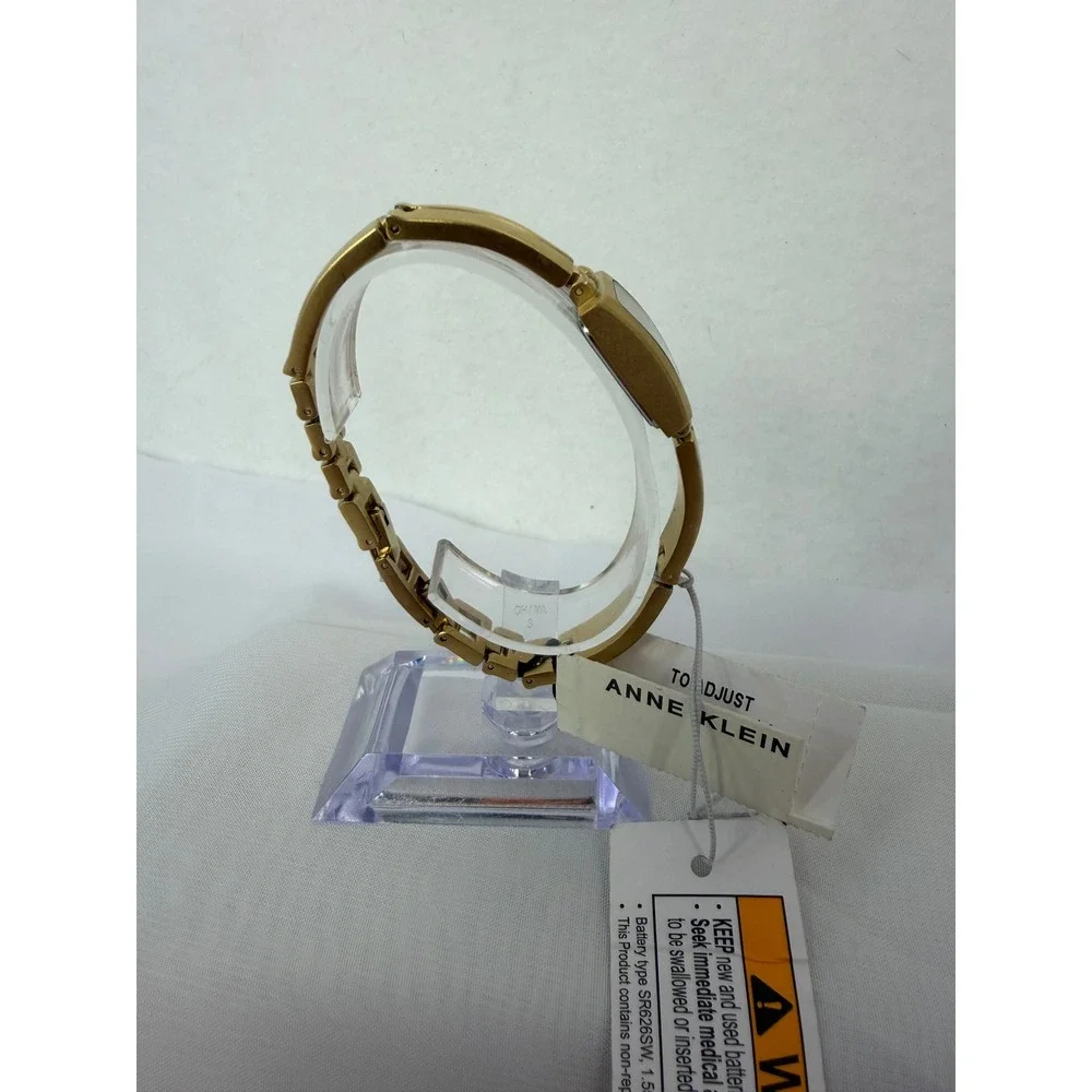 Anne Klein Womens Gold Tone Bangle Watch Rectangular Dial 10/5404GPEX New